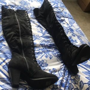 Black lace-up thigh highs